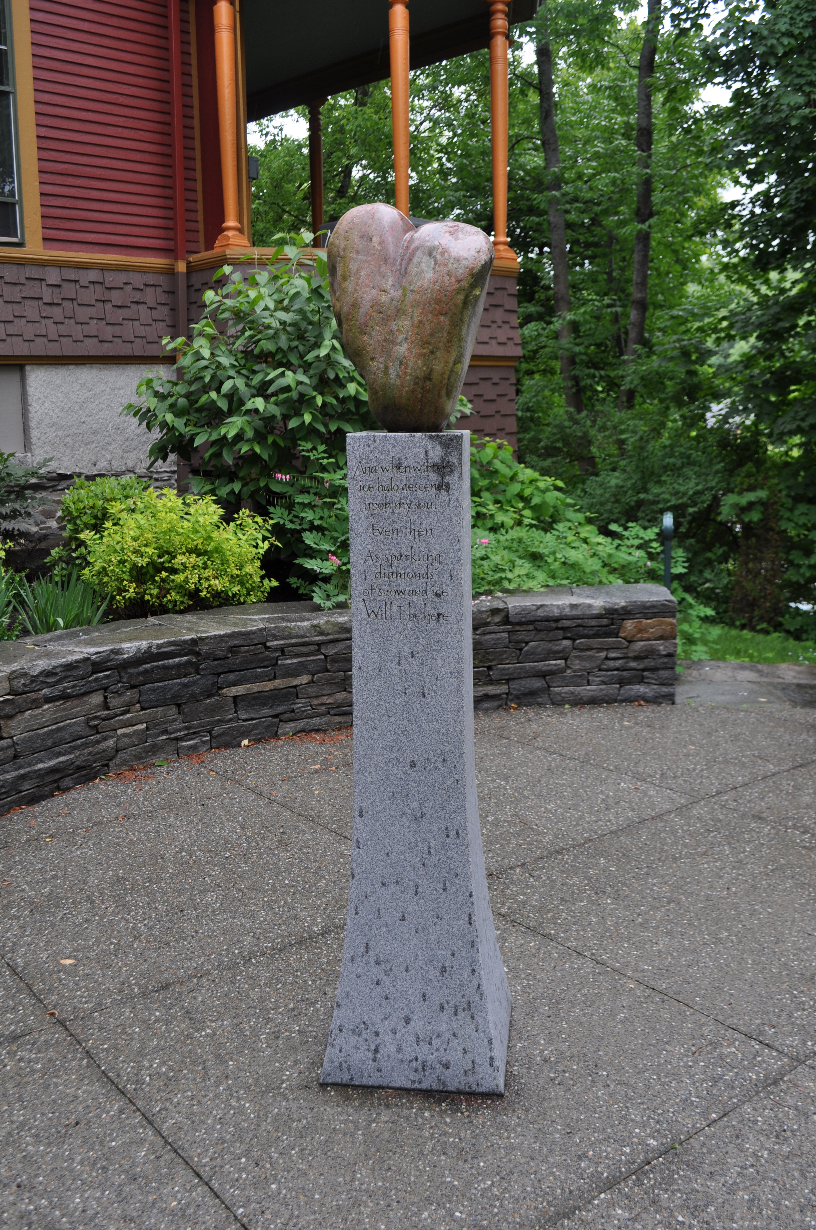 Red Heart granite statue in the Courage in Bloom Garden.